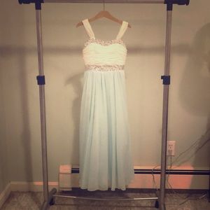 A formal white and turquoise dress